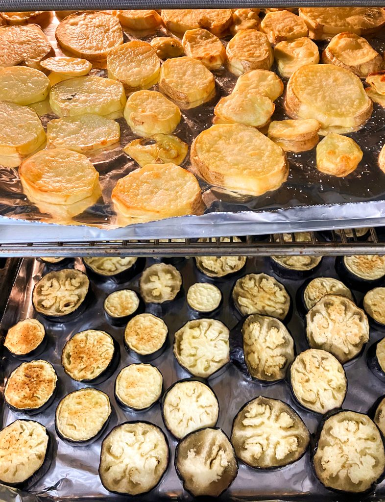 Roasting potatoes and eggplant for moussaka