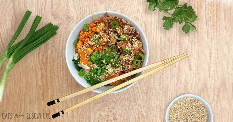 Chinese sesame chili noodles with ground pork, carrots, and spinach
