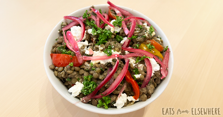 Lentil salad with goat cheese, roasted peppers, & pickled onions