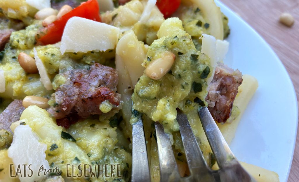 zucchini pasta sauce with sausage, tomatoes, & pine nuts