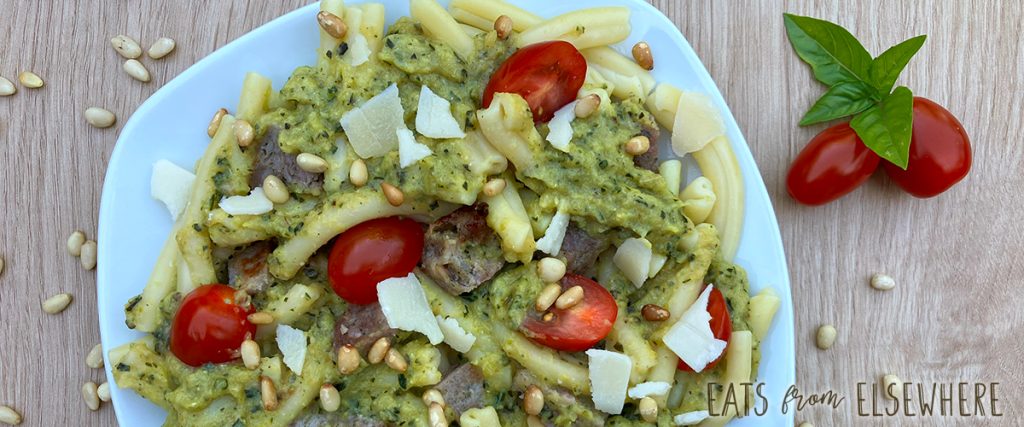 zucchini pasta sauce with sausage, tomatoes, & pine nuts