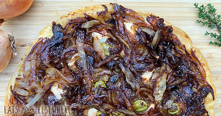 Caramelized onion tarte tatin with goat cheese, figs, and olives